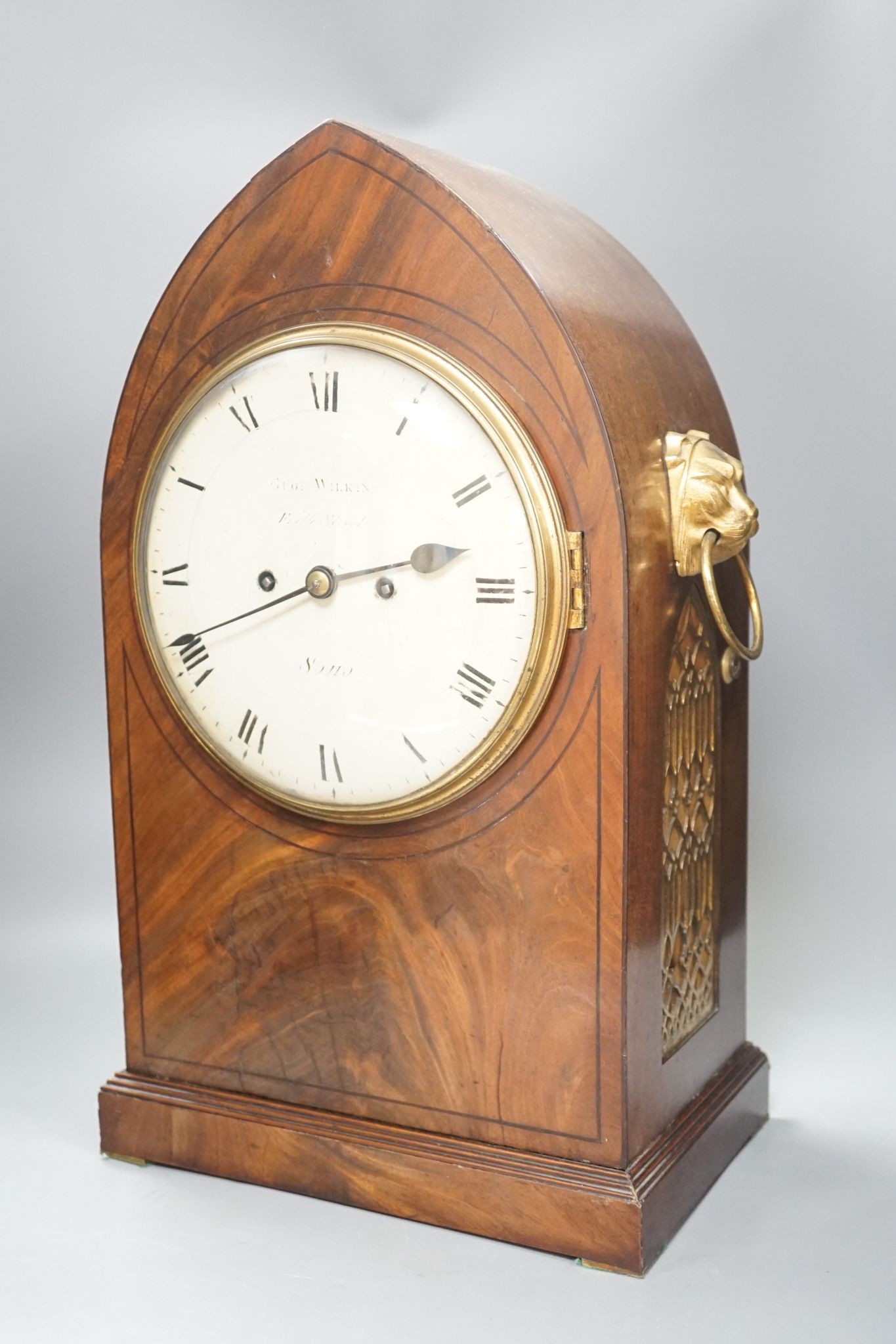 An early 19th century lancet shape mahogany mantel clock, 49cm